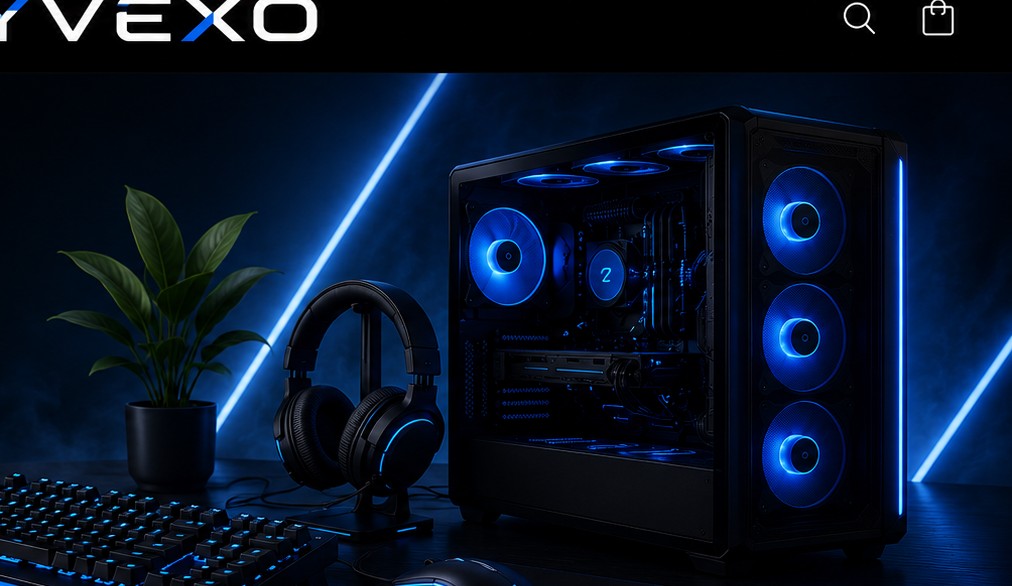 Blue-lit gaming desk setup with keyboard, mouse, headset and computer